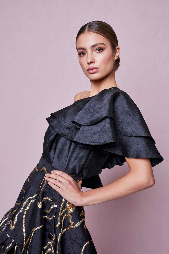 ASYMMETRICAL BLOUSE WITH RUFFLES