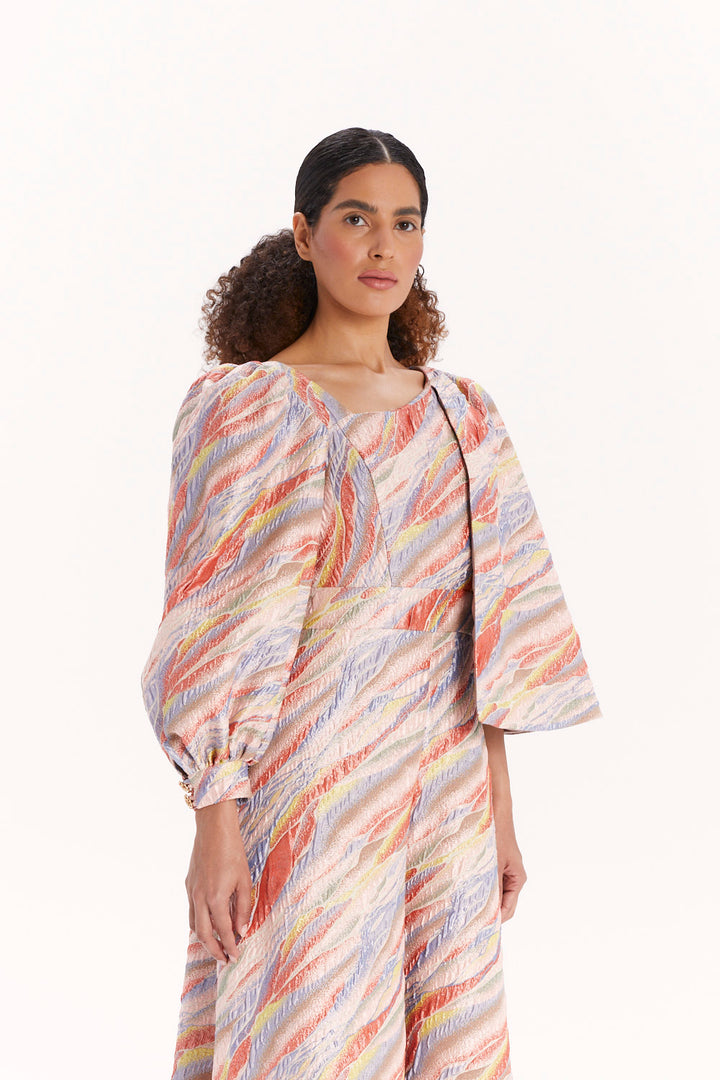 JUMPSUIT WITH WIDE LEGS AND AN ASYMMETRICAL NECKLINE