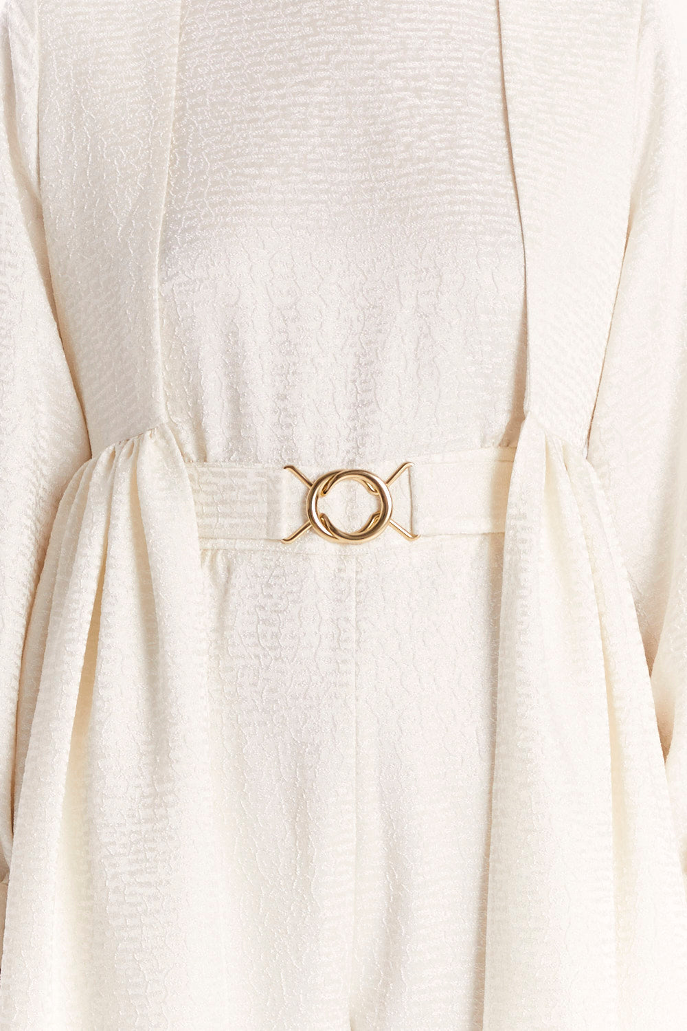 JUMPSUIT WITH A DECORATIVE BELT AND LONG CAPE