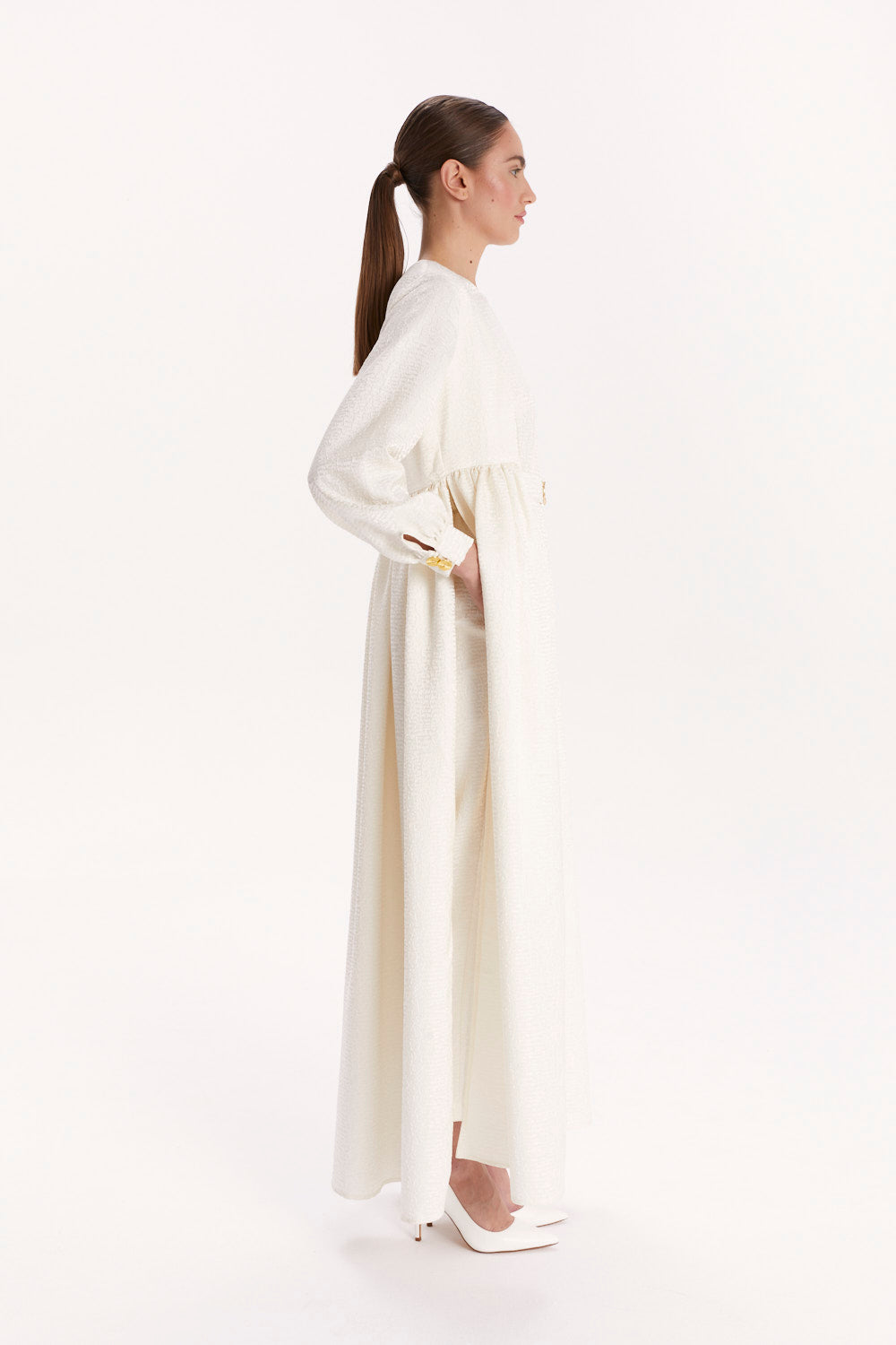 JUMPSUIT WITH A DECORATIVE BELT AND LONG CAPE