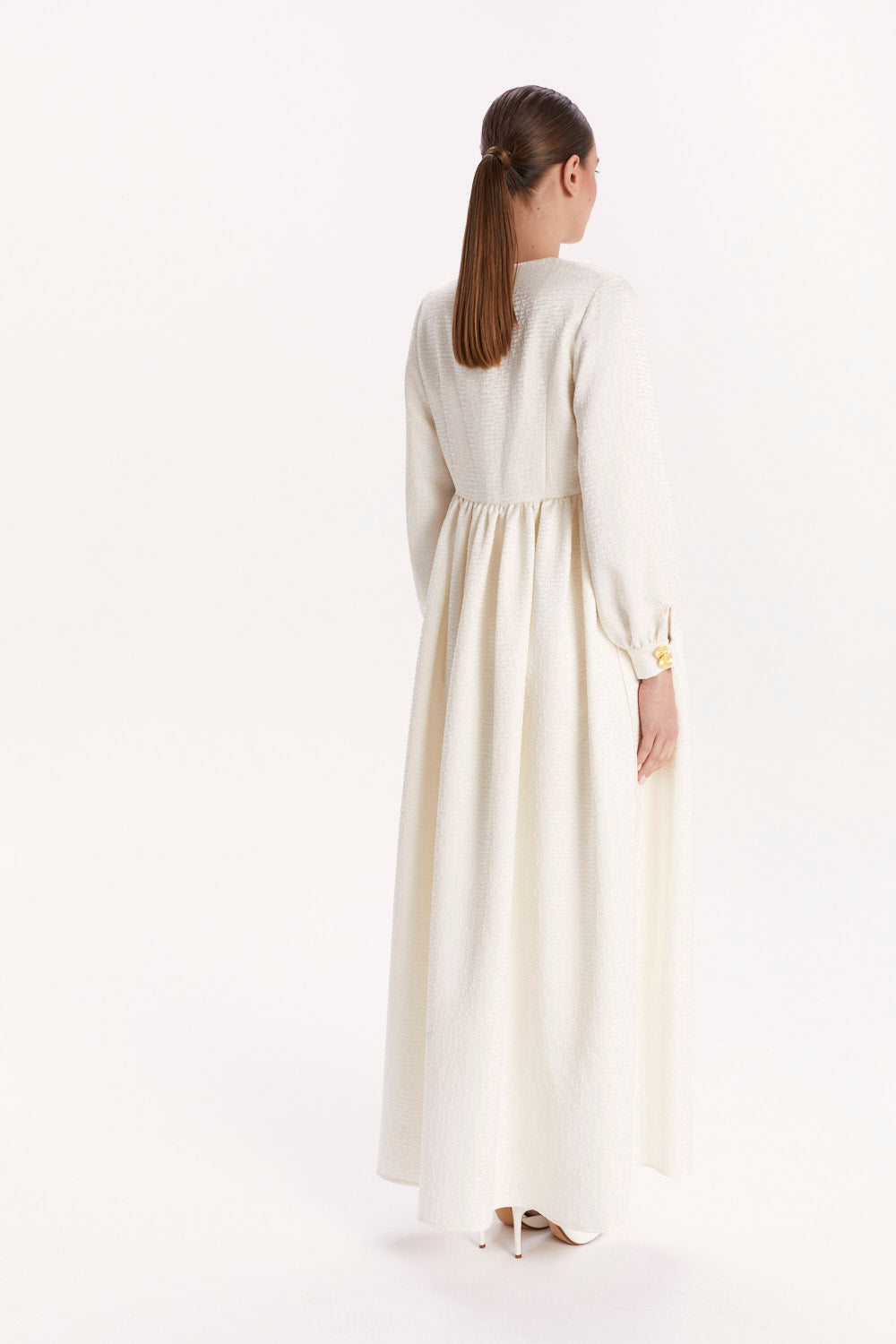 JUMPSUIT WITH A DECORATIVE BELT AND LONG CAPE