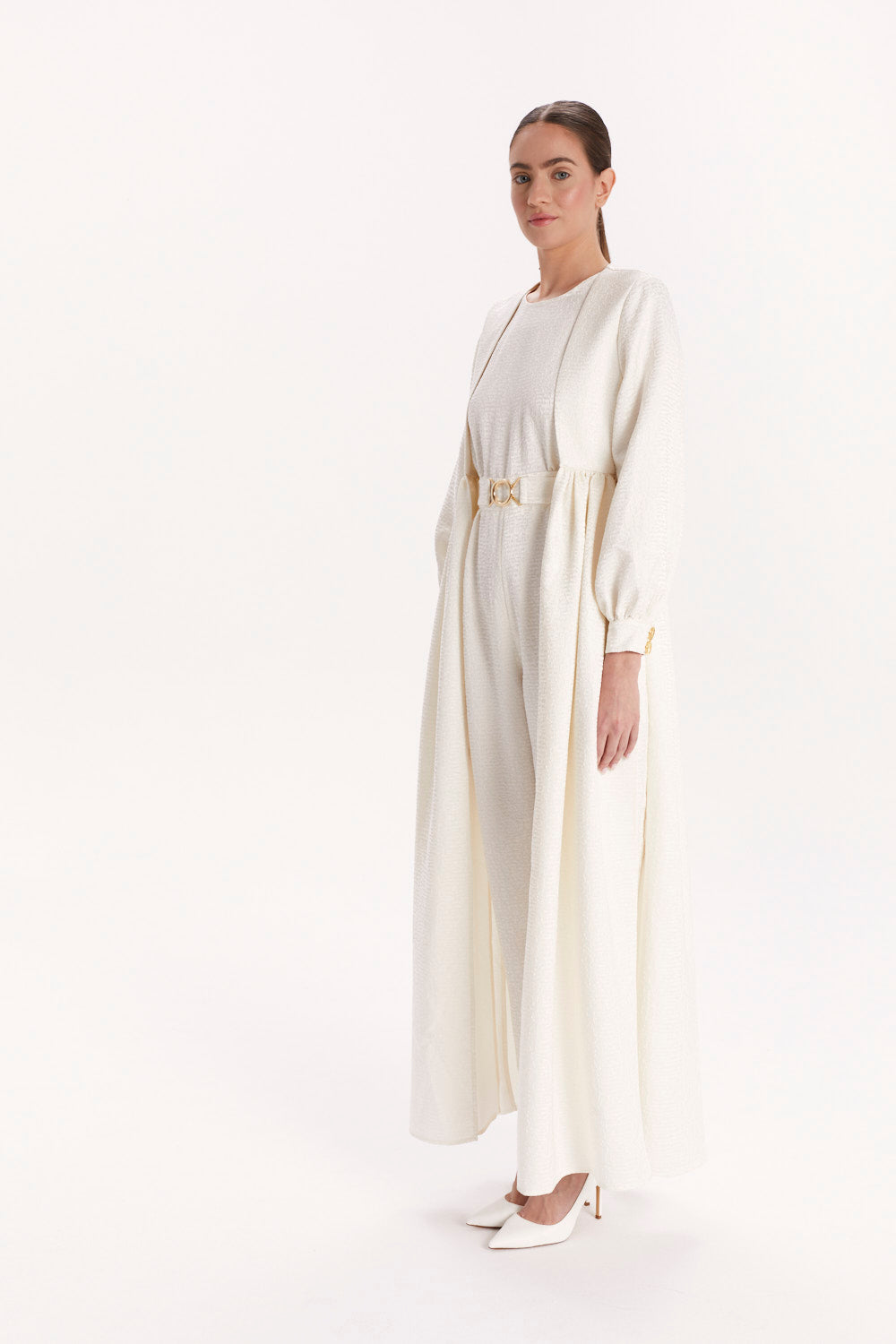 JUMPSUIT WITH A DECORATIVE BELT AND LONG CAPE