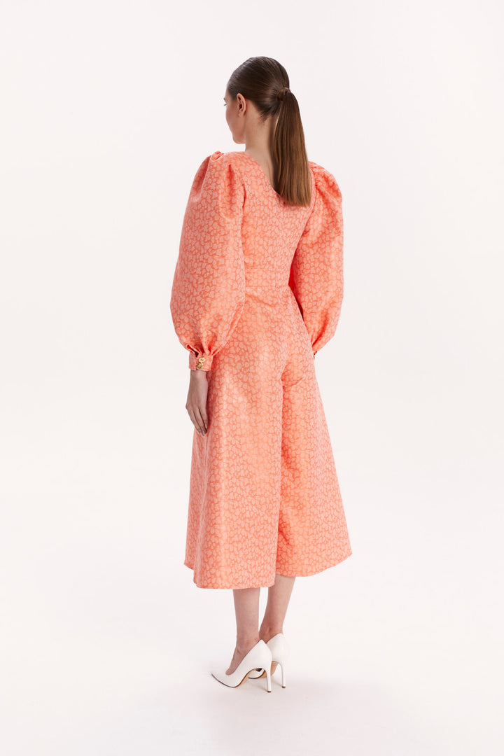 JUMPSUIT WITH AN ASYMMETRICAL NECKLINE AND WIDE LEGS