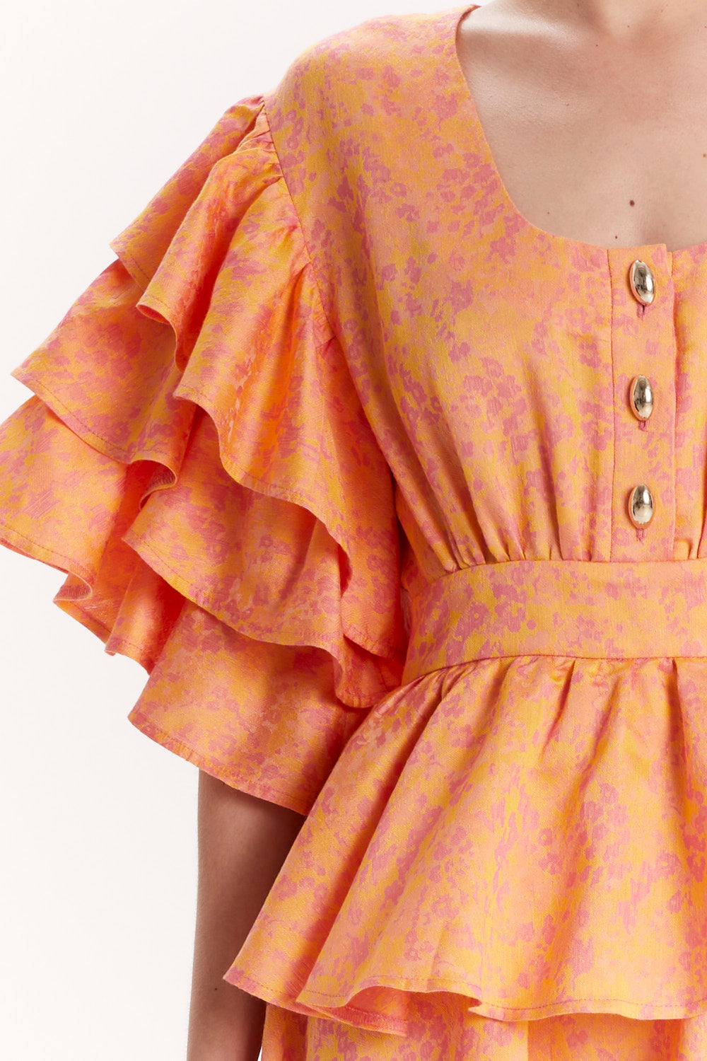 DRESS WITH RUFFLES AND DECORATIVE BUTTONS