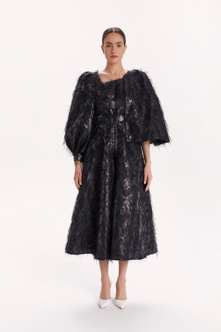 JUMPSUIT WITH ASYMMETRICAL SLEEVES AND WIDE LEGS