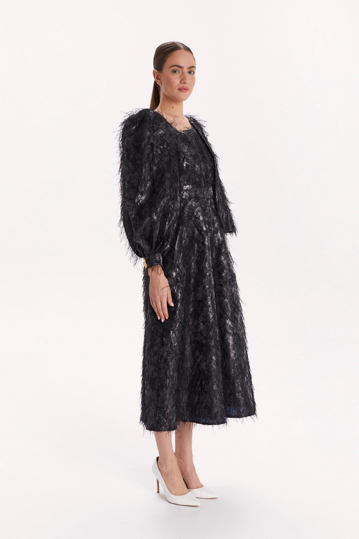 JUMPSUIT WITH ASYMMETRICAL SLEEVES AND WIDE LEGS
