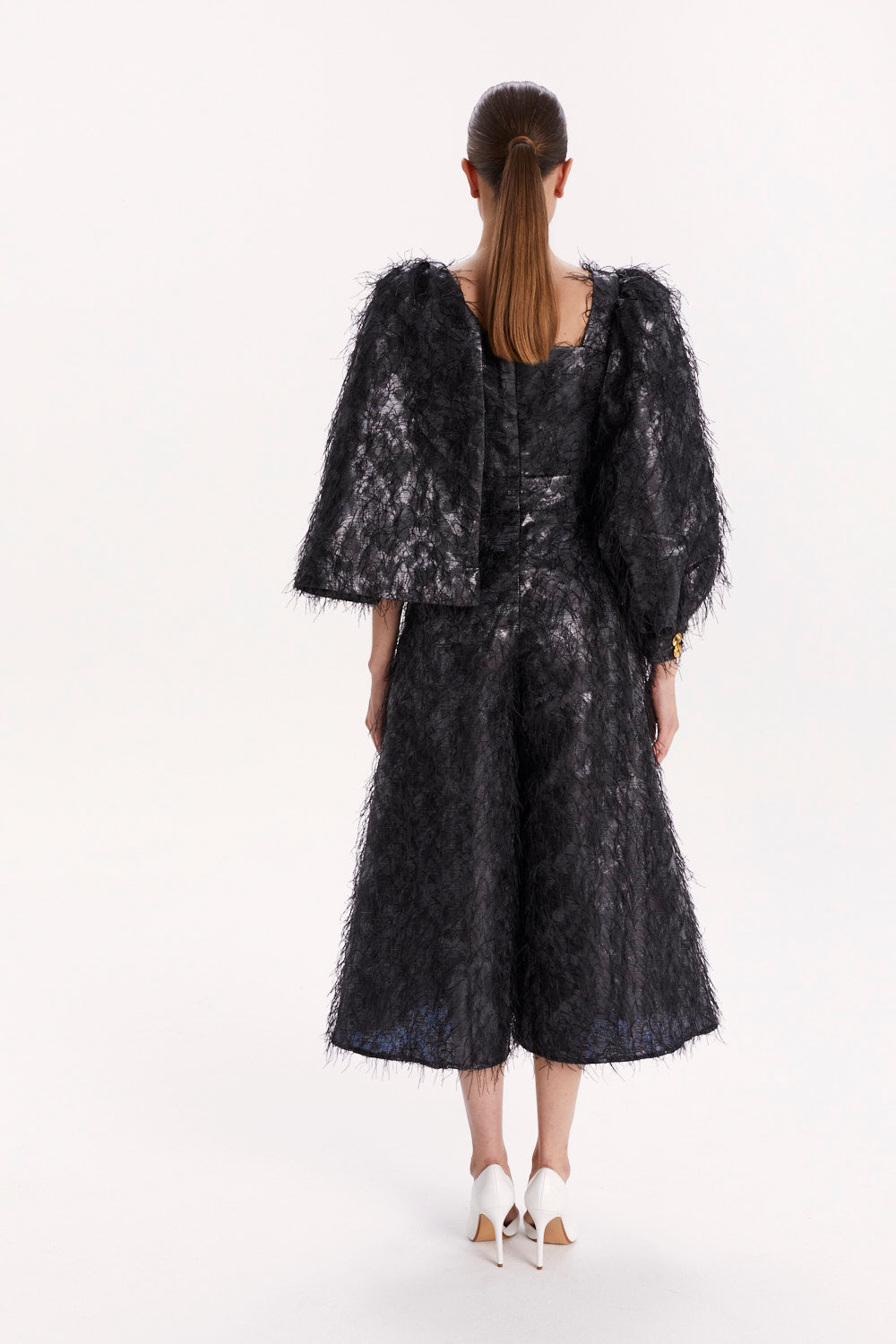 JUMPSUIT WITH ASYMMETRICAL SLEEVES AND WIDE LEGS