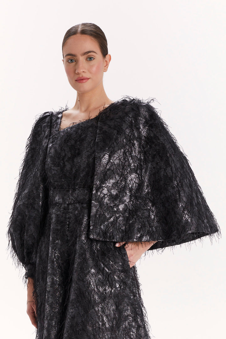 JUMPSUIT WITH ASYMMETRICAL SLEEVES AND WIDE LEGS