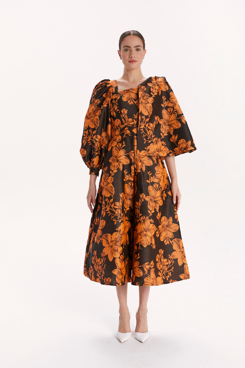 ASYMMETRIC JUMPSUIT WITH CAPE