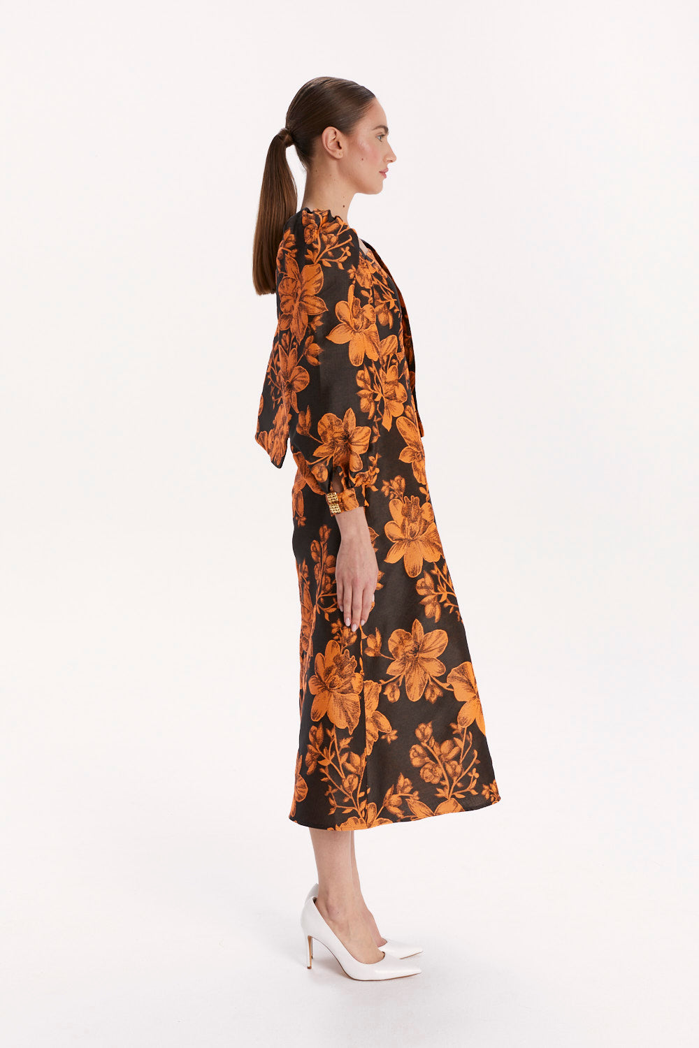 ASYMMETRIC JUMPSUIT WITH CAPE