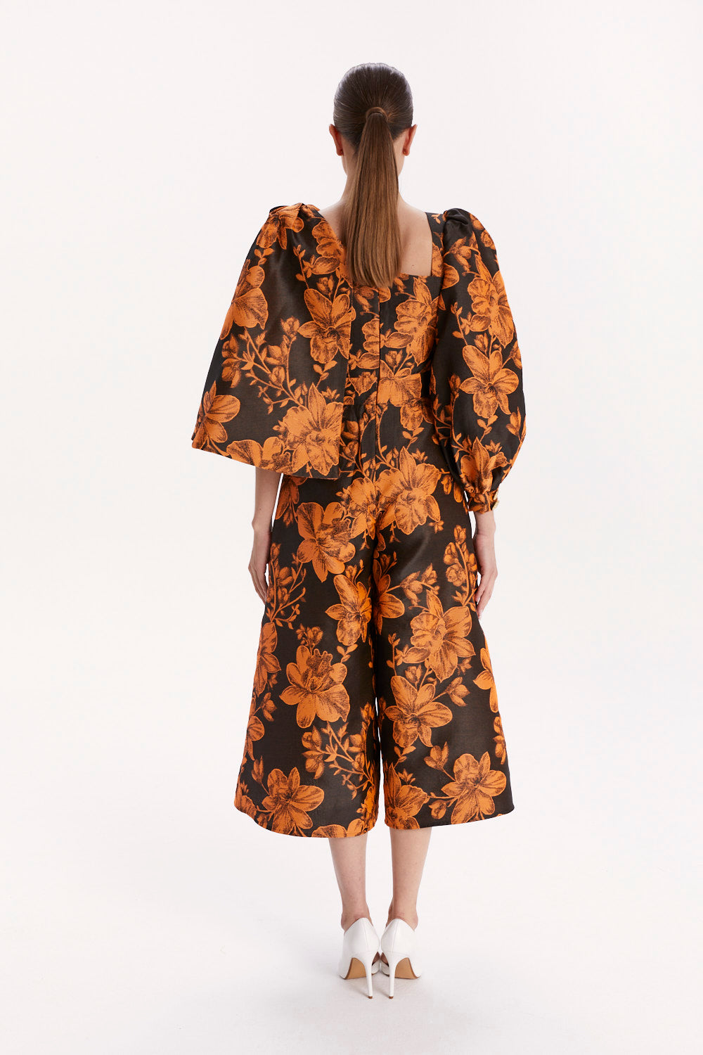 ASYMMETRIC JUMPSUIT WITH CAPE