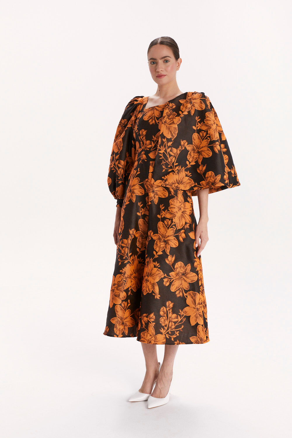 ASYMMETRIC JUMPSUIT WITH CAPE
