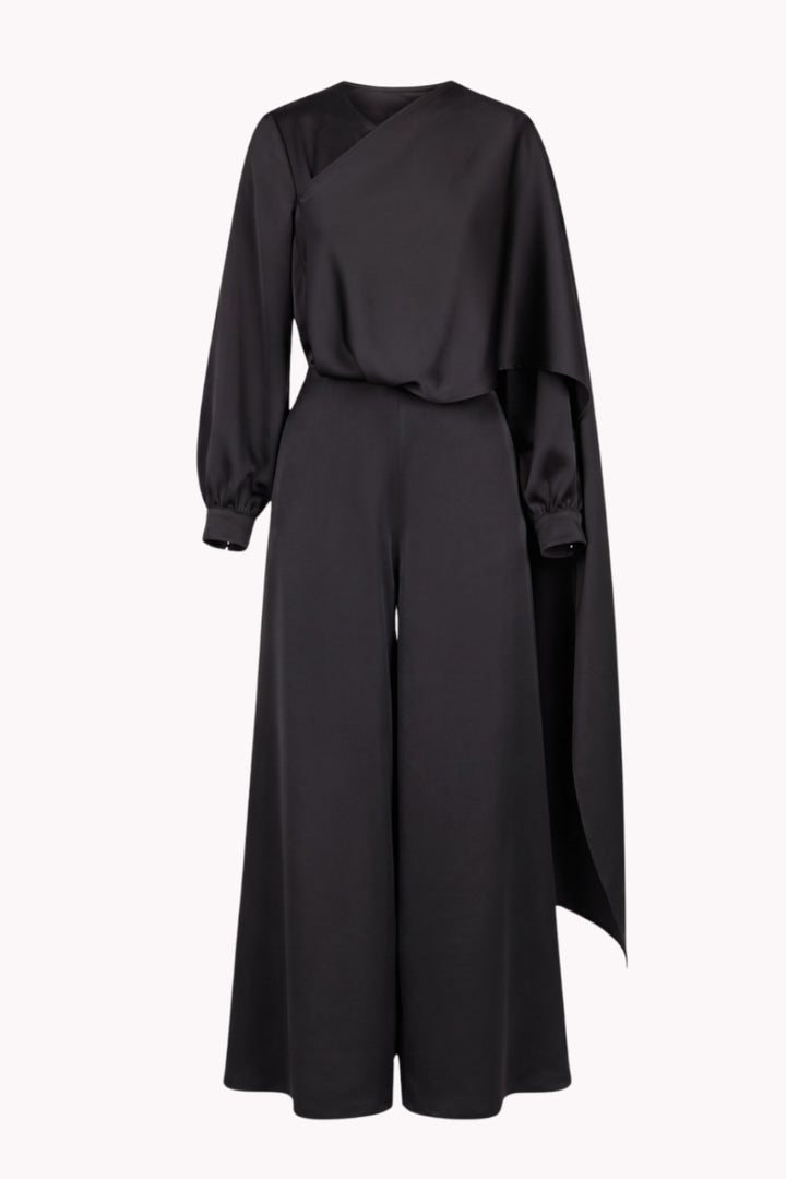 DAPHNE JUMPSUIT WITH ASYMMETRIC CAPE