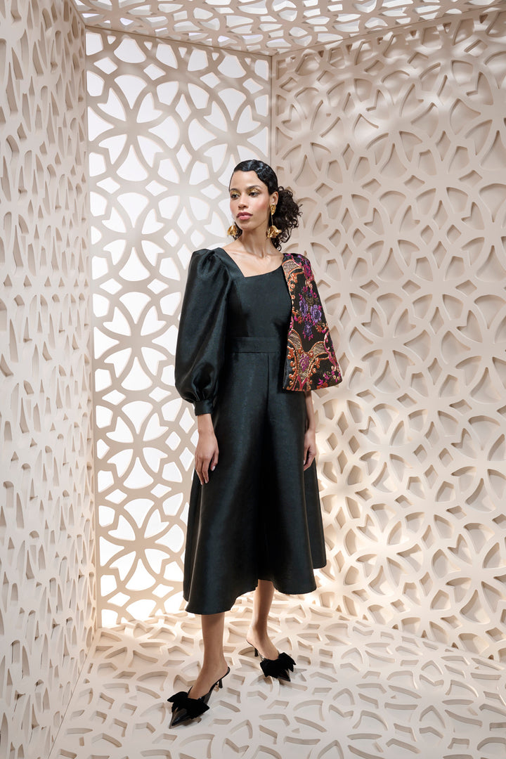 JUMPSUIT WITH WIDE LEGS AND AN ASYMMETRICAL NECKLINE