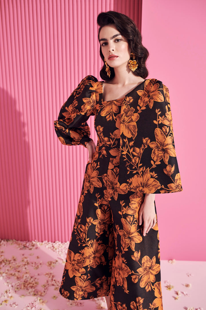 ASYMMETRIC JUMPSUIT WITH CAPE