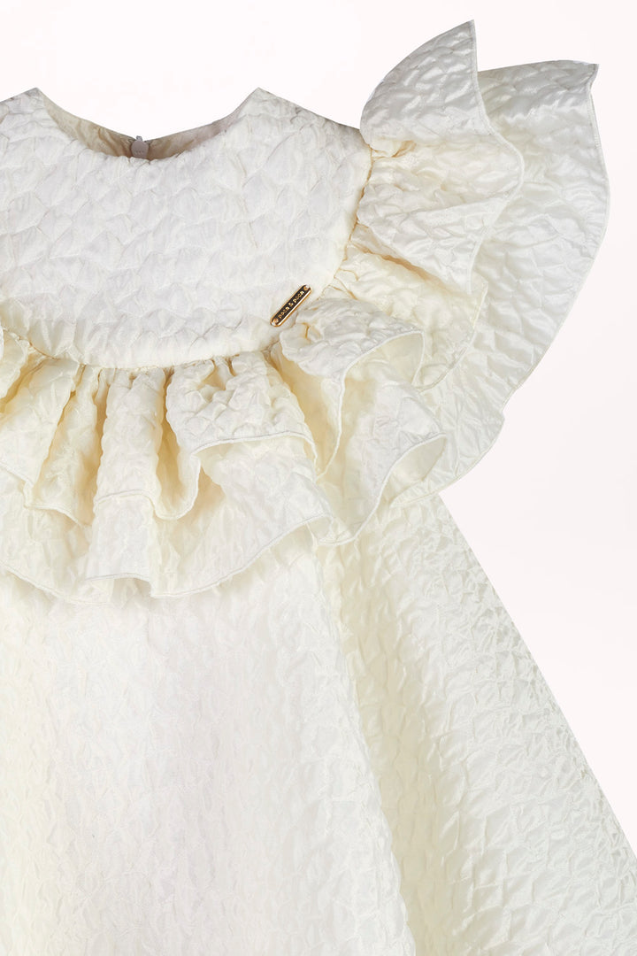 DRESS IN BUBBLE-TEXTURED FABRIC WITH A RUFFLE AT THE NECKLINE
