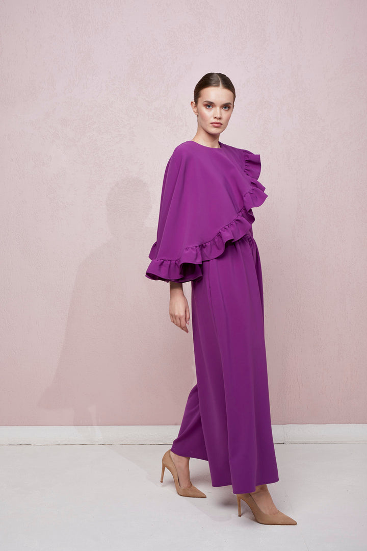 WIDE-LEG JUMPSUIT WITH AN ASYMMETRICAL CAPE